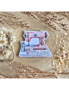 Poussière à aiguilles : machine à coudre