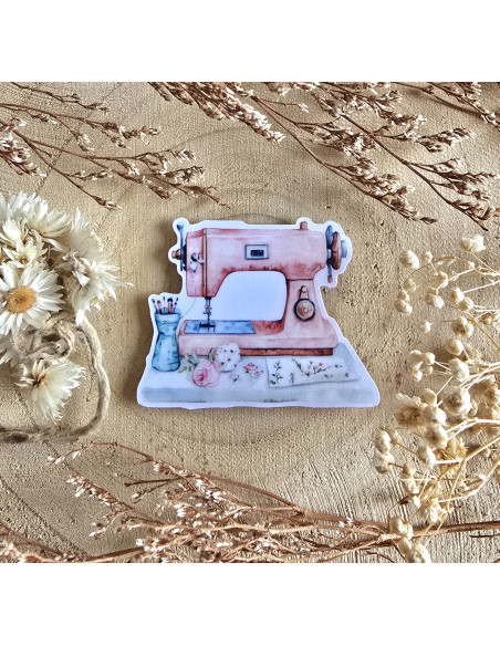 Poussière à aiguilles : machine à coudre