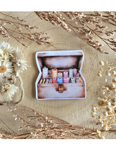 Poussière à aiguilles : malle broderie