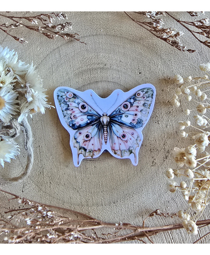 Poussière à aiguilles : Papillon