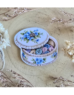 Poussière à aiguilles : Boîte à boutons